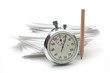 Pile of paper cards with pencil and stopwatch
