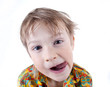 Funny boy grimacing isolated on white background