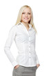 Confident businesswoman standing with hands in pockets