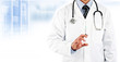 doctor in white coat holding needle