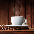 Cup of coffee with coffee beans Cup of coffee with coffee beans