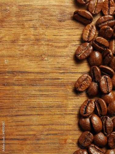 Photo: Coffee beans on wood Coffee beans on wood