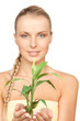 woman with green sprout