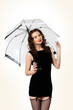 Woman dressed in retro style with umbrella Woman dressed in retro style with umbrella