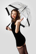 Woman dressed in retro style with umbrella Woman dressed in retro style with umbrella