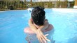 Lovers enjoying swimming-pool time