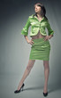 young woman in green dress