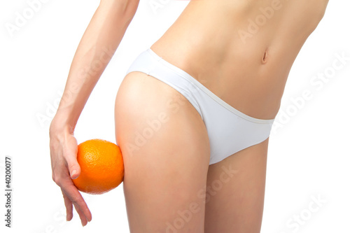 Foto: Hip, legs, abdomen and orange in hand cellulite liposuction Hip, legs, abdomen and orange in hand cellulite liposuction
