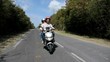 Young people having fun on a motorbike