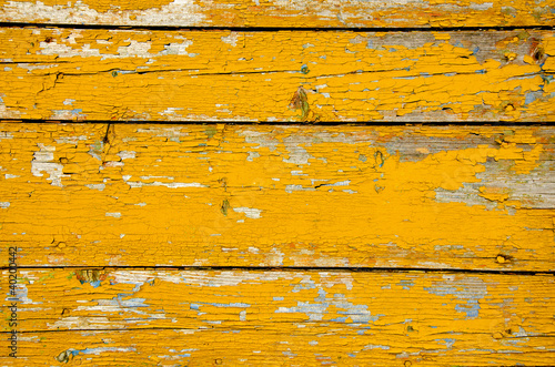 Photo: background of peel retro grunge wooden wall plank background of peel retro grunge wooden wall plank