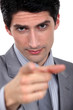 businessman pointing at you