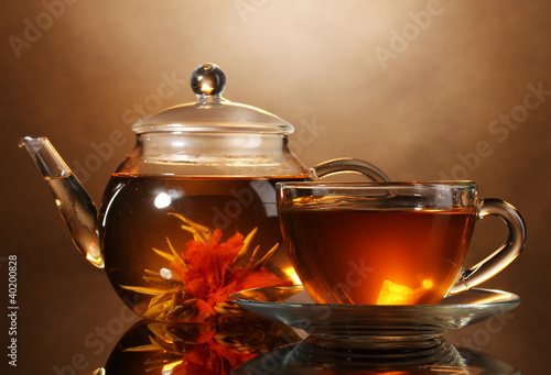 Photo: glass teapot and cup with exotic green tea glass teapot and cup with exotic green tea