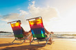 Happy Romantic Couple Enjoying Beautiful Sunset at the Beach