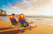 Happy Romantic Couple Enjoying Beautiful Sunset at the Beach