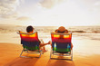 Happy Romantic Couple Enjoying Beautiful Sunset at the Beach