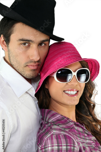 Photo: Couple wearing funny hats Couple wearing funny hats