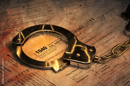 Photo: Tax fraud image with grunge effect Tax fraud image with grunge effect