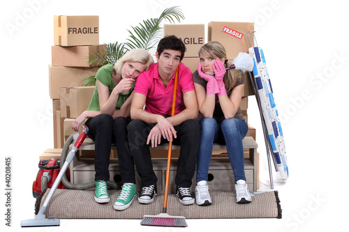 Photo: Tired roommates on moving day Tired roommates on moving day