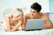Young couple working with laptop Young couple working with laptop