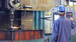 Worker grinding wheel of locomotives