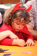 Girl disguised as a devil
