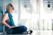 Pretty young female student with a laptop computer on college/un