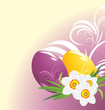 Easter eggs and bouquet of daffodils
