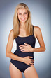 Photo: happy blonde woman in black swimsuit happy blonde woman in black swimsuit