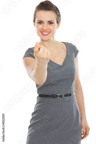 Photo: Modern business woman beckoning with finger Modern business woman beckoning with finger