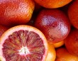 Blood oranges at the greengocer on the market