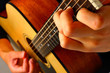 Closeup view of playing classic spanish guitar