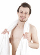Photo: young man with white towel, white background young man with white towel, white background