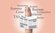 a finger read news paper