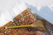 Cleaning the carpet with snow