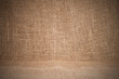 Close-up of natural burlap hessian sacking. Background texture u Close-up of natural burlap hessian sacking. Background texture u