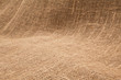 Close-up of natural burlap hessian sacking. Background texture u Close-up of natural burlap hessian sacking. Background texture u