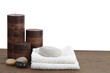 Photo: Spa still life with candles, pumice stone and towels Spa still life with candles, pumice stone and towels