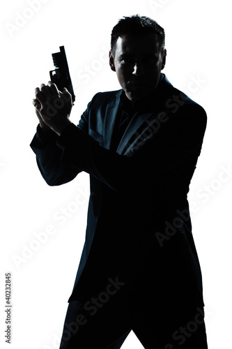 Photo: silhouette man portrait with gun silhouette man portrait with gun