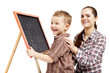 boy learns to write on the blackboard.