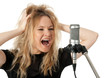 Photo: Rock singer screaming to the microphone Rock singer screaming to the microphone