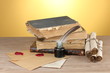 old books, scrolls, feather pen and inkwell old books, scrolls, feather pen and inkwell