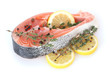 Red fish with lemon and thyme isolated on white.