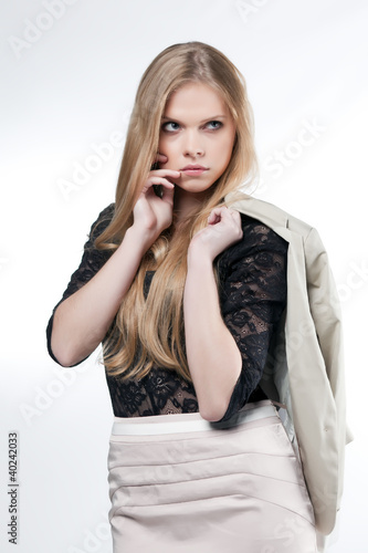 Photo: girl model in a business suit girl model in a business suit