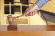 Judge wooden gavel on  background