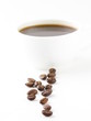 macro shot of coffee beans ,small cup of coffee espresso