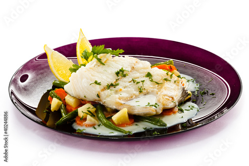 Photo: Fish dish - fish fillet in sauce and vegetables Fish dish - fish fillet in sauce and vegetables