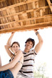 Young couple smiling, portrait