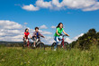 Family riding bikes