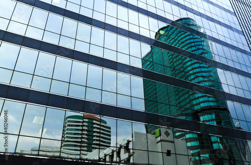 Photo: Highrise glass with building reflection Highrise glass with building reflection