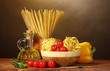 spaghetti, noodles in bowl, jar of oil and vegetables spaghetti, noodles in bowl, jar of oil and vegetables